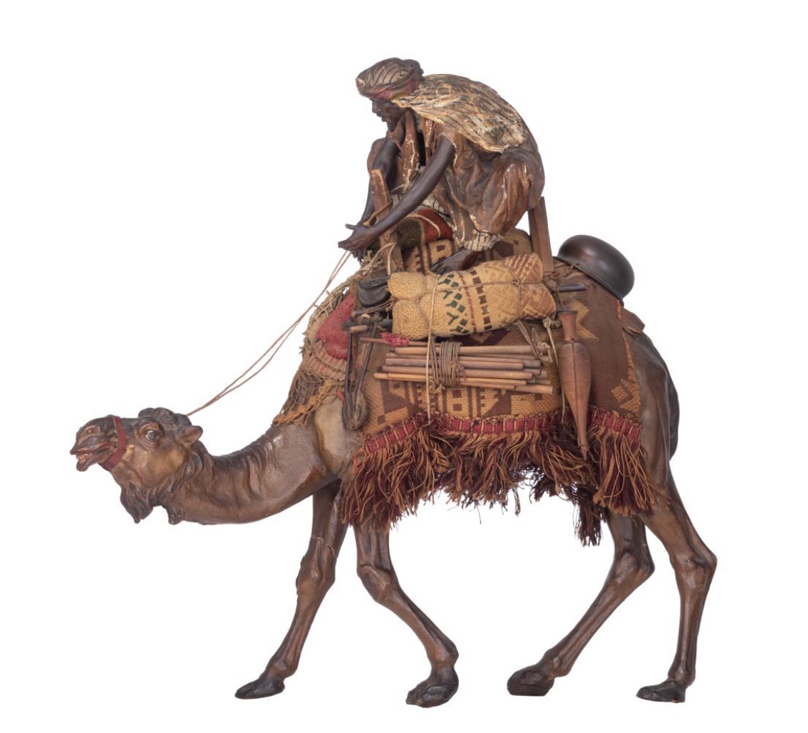 Arab on his camel, in pipe clay , in the manner of Angela Tripi,  circa 1900