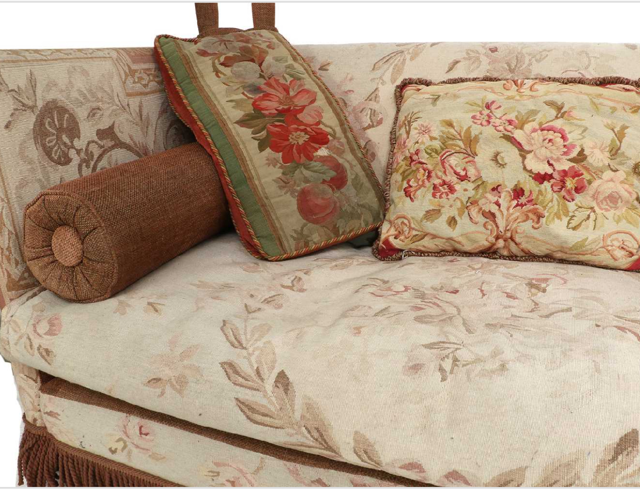 A feather-filled knole-style sofa