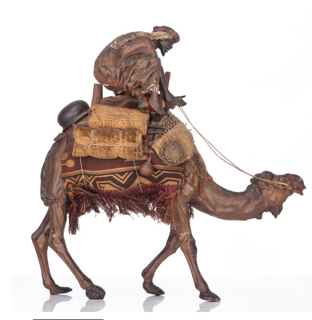Arab on his camel, in pipe clay , in the manner of Angela Tripi,  circa 1900