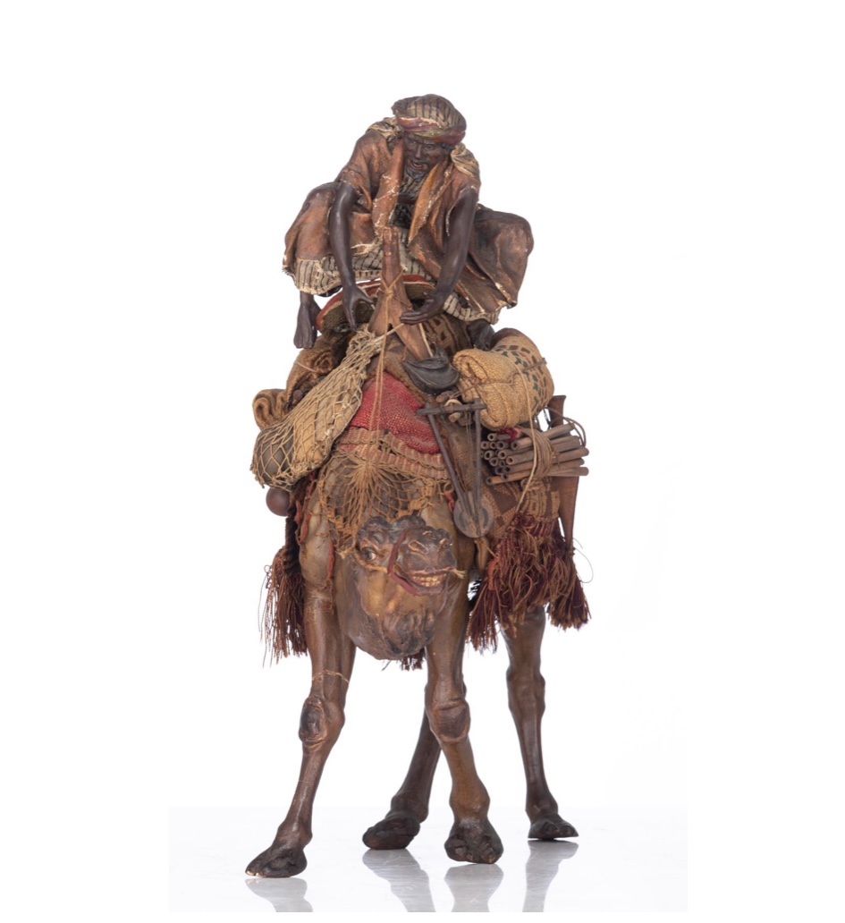Arab on his camel, in pipe clay , in the manner of Angela Tripi,  circa 1900
