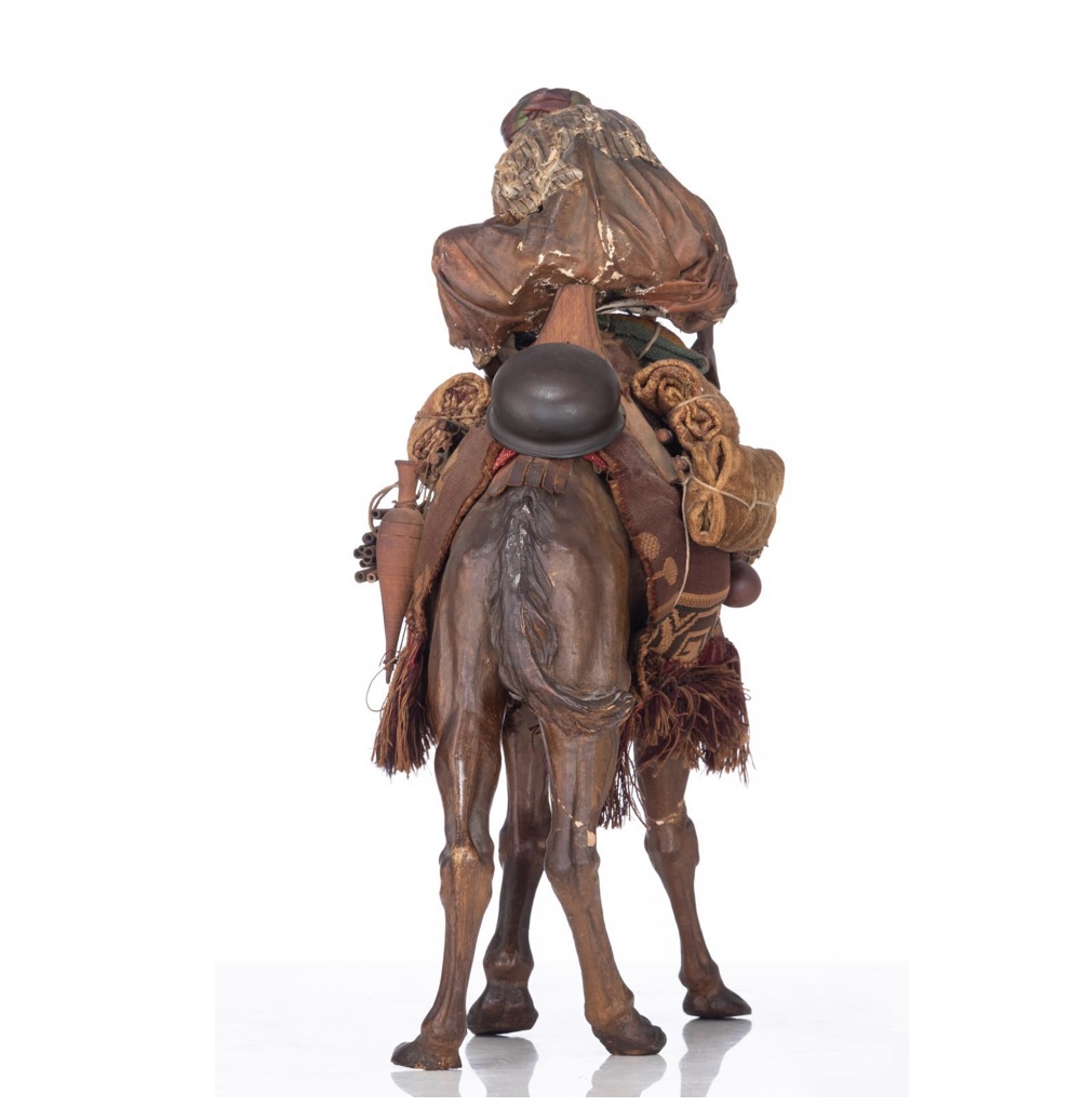 Arab on his camel, in pipe clay , in the manner of Angela Tripi,  circa 1900