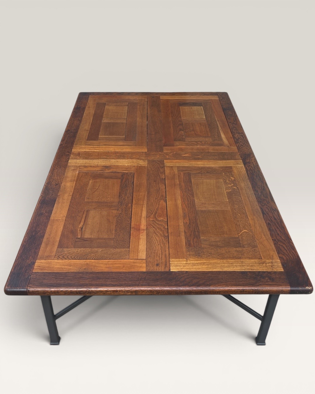 Coffee table with 19 cent.wooden top and iron base