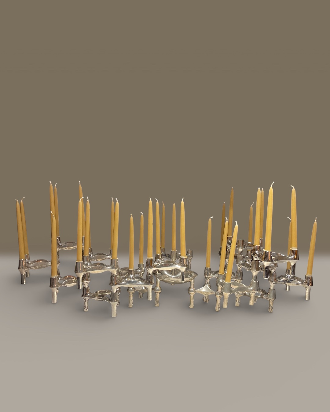 Modular candle holder in chrome, consisting of 18 elements plus base. Designed by Werner Stoff for Hans Nagel, 1960s.
