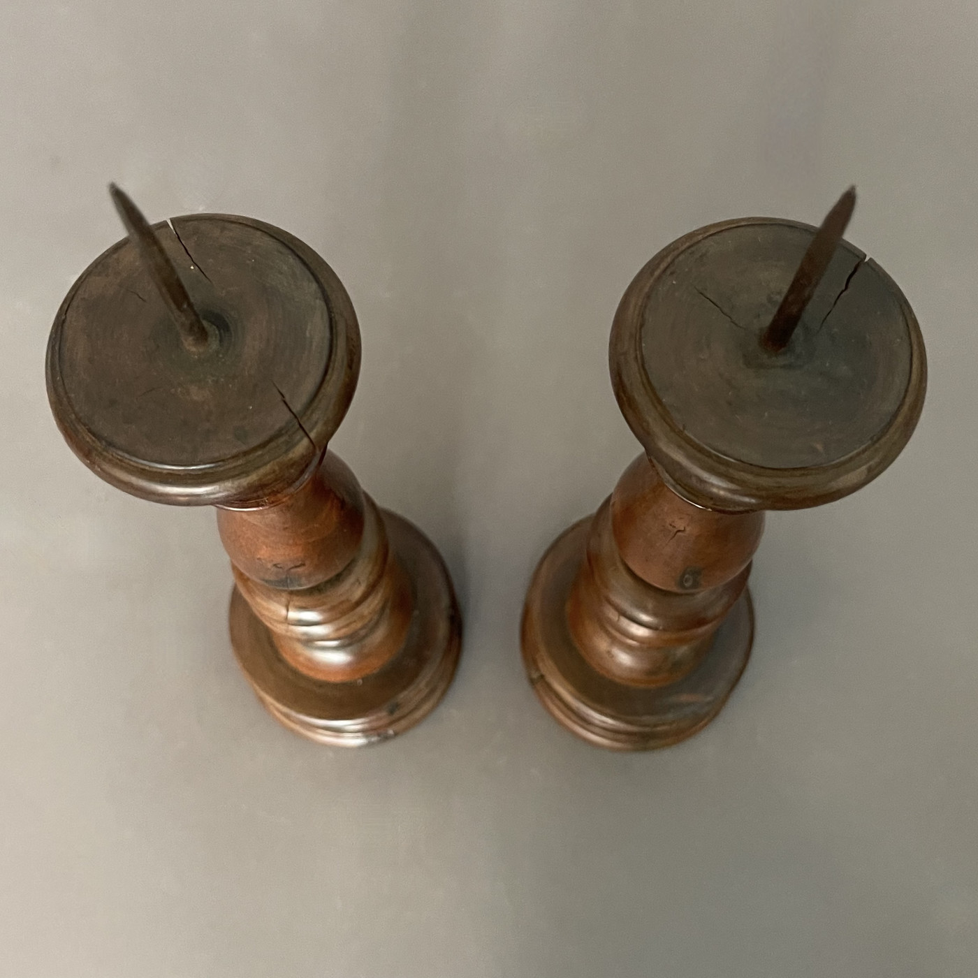 Pair of Italian walnut candlesticks